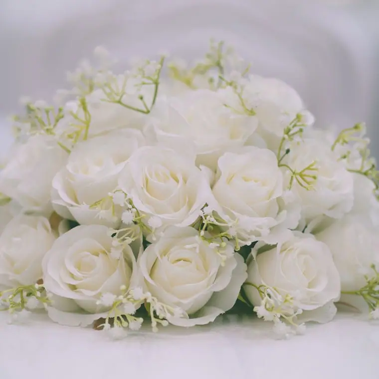 An elegant white rose bouquet for the ceremony
