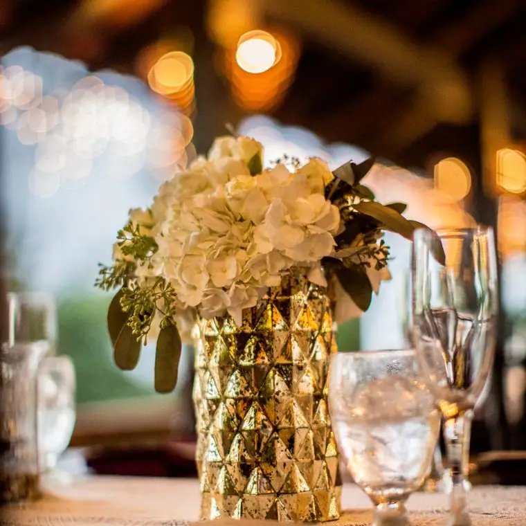 A floral centerpiece glowing with bokeh light